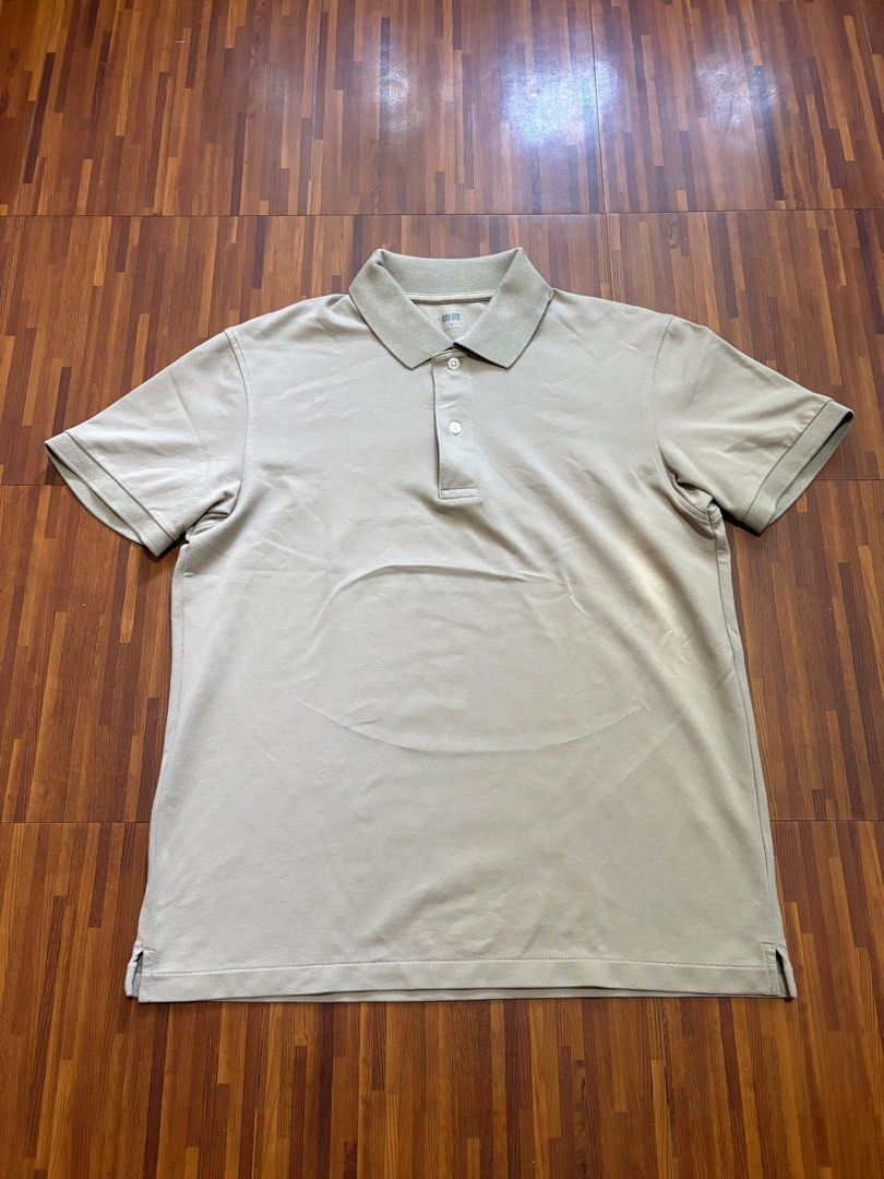 Uniqlo Polo Shirt (Category: Tshirts & Polo Shirts ) located in Pasig City. Submitted by _nicnic_ (Listing ID 1412325741, Image 1). Description: • L26.5 W19.5 • In pristine condition.