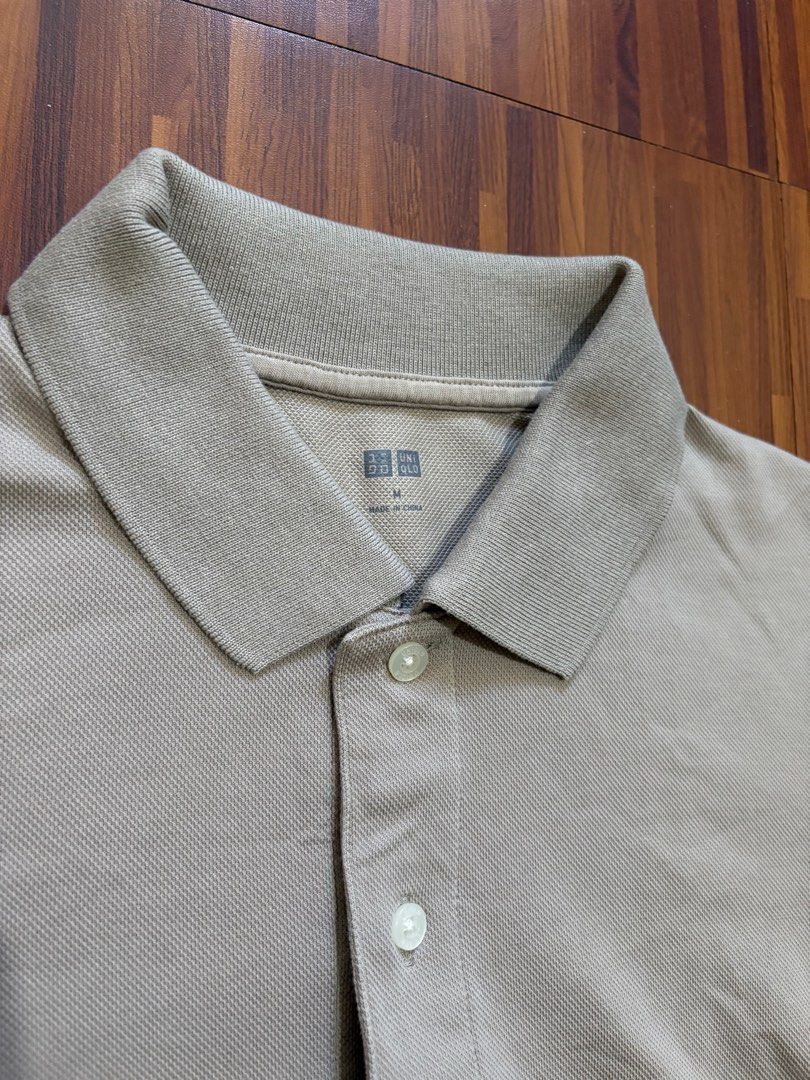 Uniqlo Polo Shirt (Category: Tshirts & Polo Shirts ) located in Pasig City. Submitted by _nicnic_ (Listing ID 1412325741, Image 2). Description: • L26.5 W19.5 • In pristine condition.