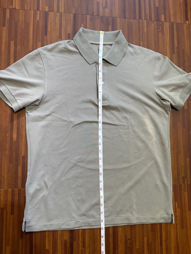 Uniqlo Polo Shirt (Category: Tshirts & Polo Shirts ) located in Pasig City. Submitted by _nicnic_ (Listing ID 1412325741, Image 3). Description: • L26.5 W19.5 • In pristine condition.