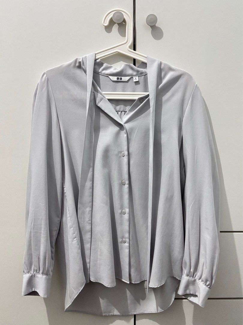 Uniqlo White Button-Up Shirt (Category: Shirts) located in Manila. Submitted by decluttaro (Listing ID 1412282100, Image 2). Description: - Uniqlo White Button-Up Shirt - Size L - Excellent condition - Versatile design - Perfect for everyday wear RFS: DECLUTTERING USED TWICE ONLY.
