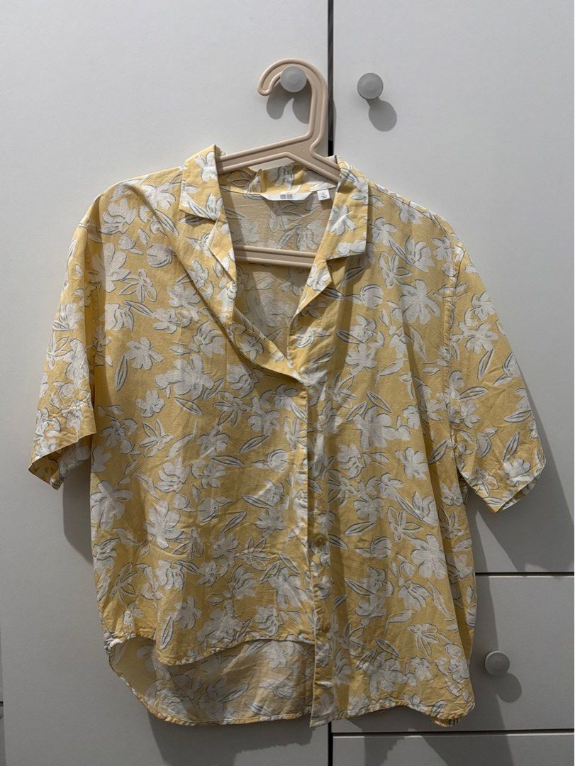 Uniqlo White Button-Up Shirt (Category: Shirts) located in Manila. Submitted by decluttaro (Listing ID 1412282100, Image 3). Description: - Uniqlo White Button-Up Shirt - Size L - Excellent condition - Versatile design - Perfect for everyday wear RFS: DECLUTTERING USED TWICE ONLY.