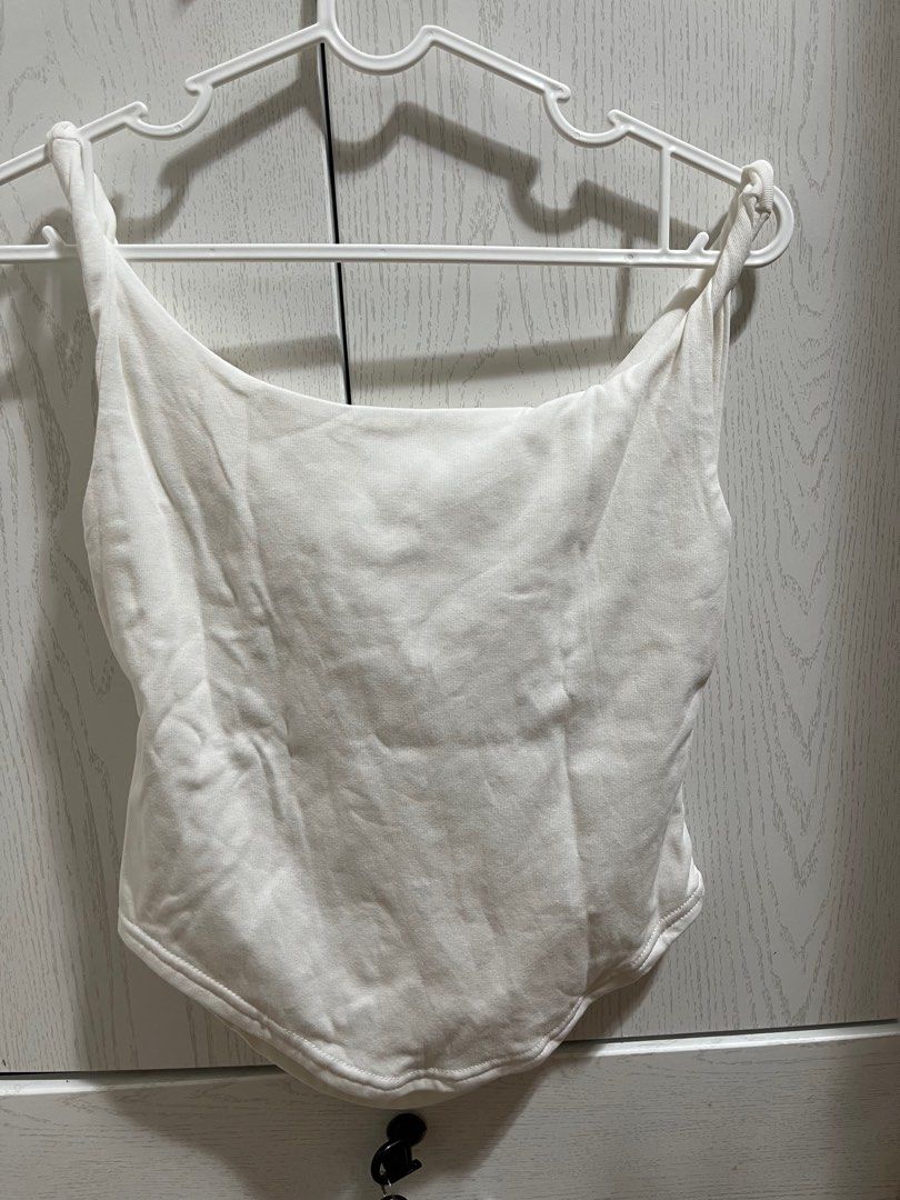 White Cowl Neck Top (Category: Sleeveless) located in Quezon City. Submitted by daniellearienne (Listing ID 1412310442, Image 2). Description: brand new bought from thailand mop: gcash mod: grab/lalamove, lbc loc: anonas, quezon city .