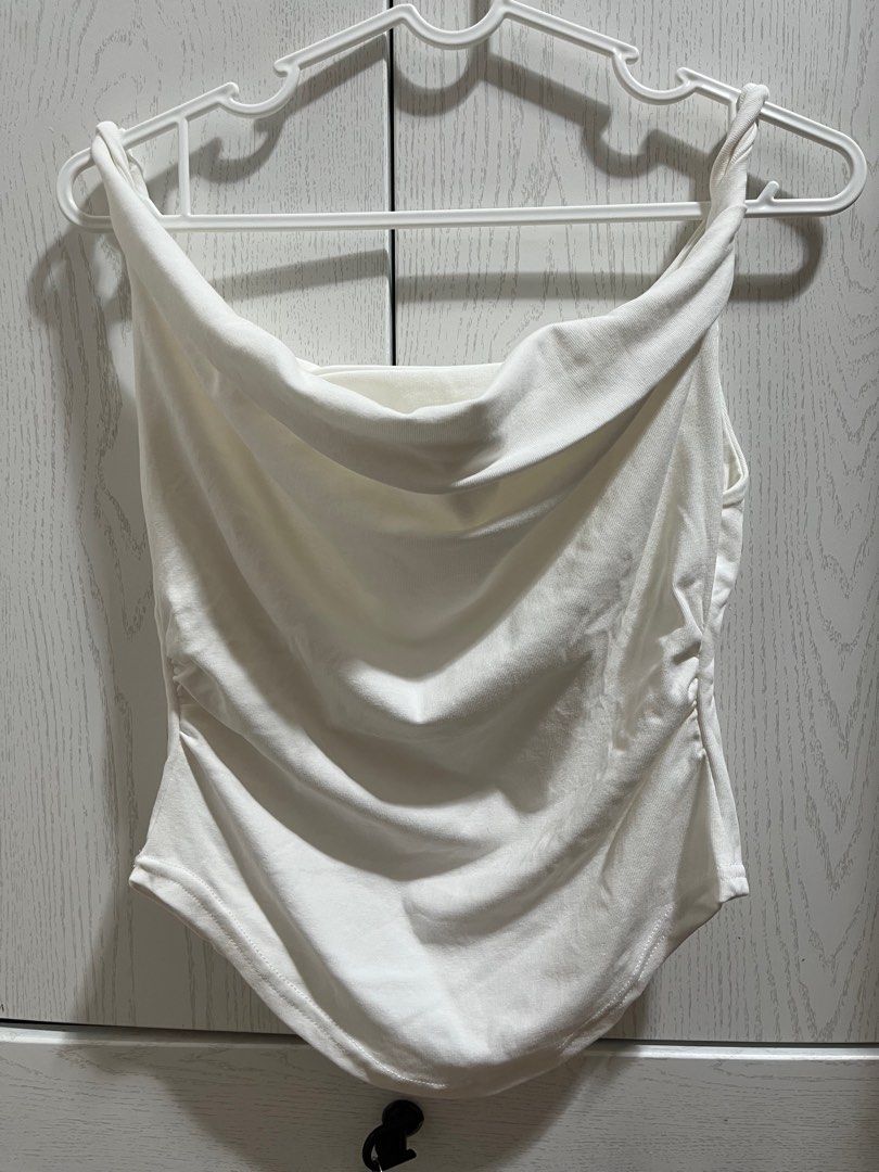 White Cowl Neck Top (Category: Sleeveless) located in Quezon City. Submitted by daniellearienne (Listing ID 1412310442, Image 1). Description: brand new bought from thailand mop: gcash mod: grab/lalamove, lbc loc: anonas, quezon city .