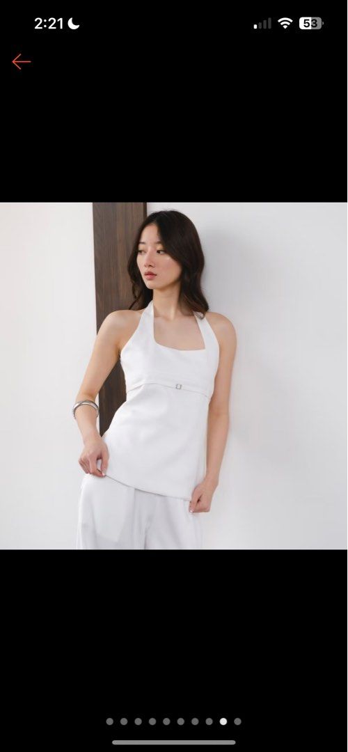 White Halter Top Size Small (Category: Sleeveless) located in Quezon City. Submitted by shopby_a (Listing ID 1412192109, Image 1). Description: - White halter top - Square neckline - Waist buckle detail - Smooth, satin-like material - Simple and clean design - Versatile for various occasions (used once only).