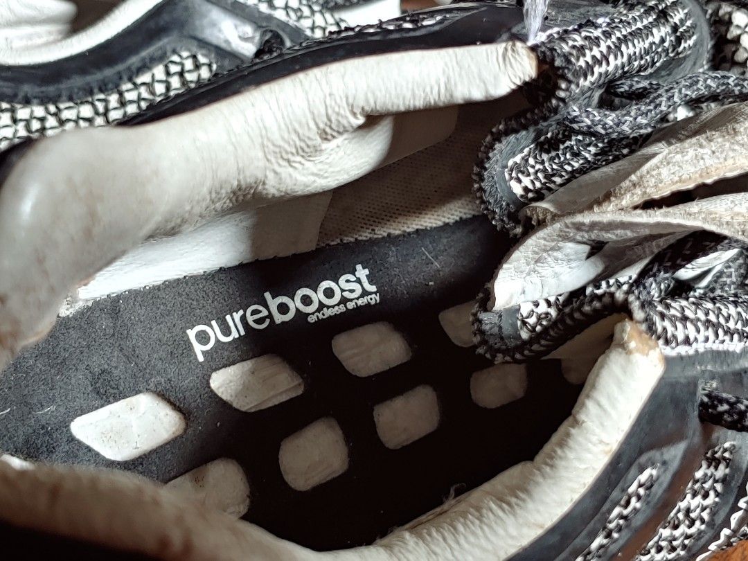 Y-3 Adidas Pureboost Y3 USM9.5 (Category: Sneakers) located in Manila. Submitted by retroactive_items (Listing ID 1412175381, Image 2). Description: Adidas Pureboost Y-3 Size: US 9.5 Mens Will fit Size 9 (will include boost insole) Good condition. No sole sep. Slight yellowing of boost. See last picture for Minor Issue Selling for 1.5k for 2k Buyer books / shoulders shipping. Ai generated - Y-3 Yohji Yamamoto Pureboost sneakers - Black and white 