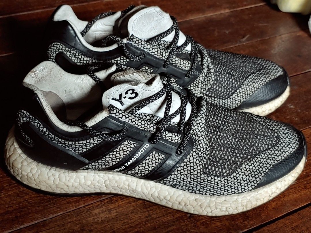 Y-3 Adidas Pureboost Y3 USM9.5 (Category: Sneakers) located in Manila. Submitted by retroactive_items (Listing ID 1412175381, Image 3). Description: Adidas Pureboost Y-3 Size: US 9.5 Mens Will fit Size 9 (will include boost insole) Good condition. No sole sep. Slight yellowing of boost. See last picture for Minor Issue Selling for 1.5k for 2k Buyer books / shoulders shipping. Ai generated - Y-3 Yohji Yamamoto Pureboost sneakers - Black and white 