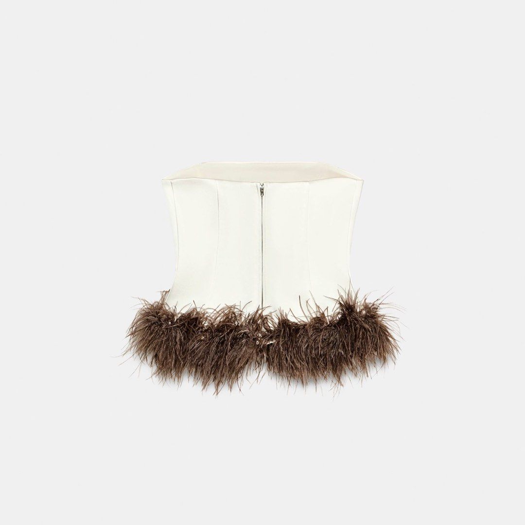 Zara Feather Trim Corset Top - XL (Category: Others Tops) located in Paranaque City. Submitted by ysaclutters (Listing ID 1412270087, Image 2). Description: - Zara corset top bought in Hong Kong - Size: XL - Features: - Flattering silhouette - Feather trim - Back zipper closure - Delicate straps - Original price: HK$799 (PHP 6,038).