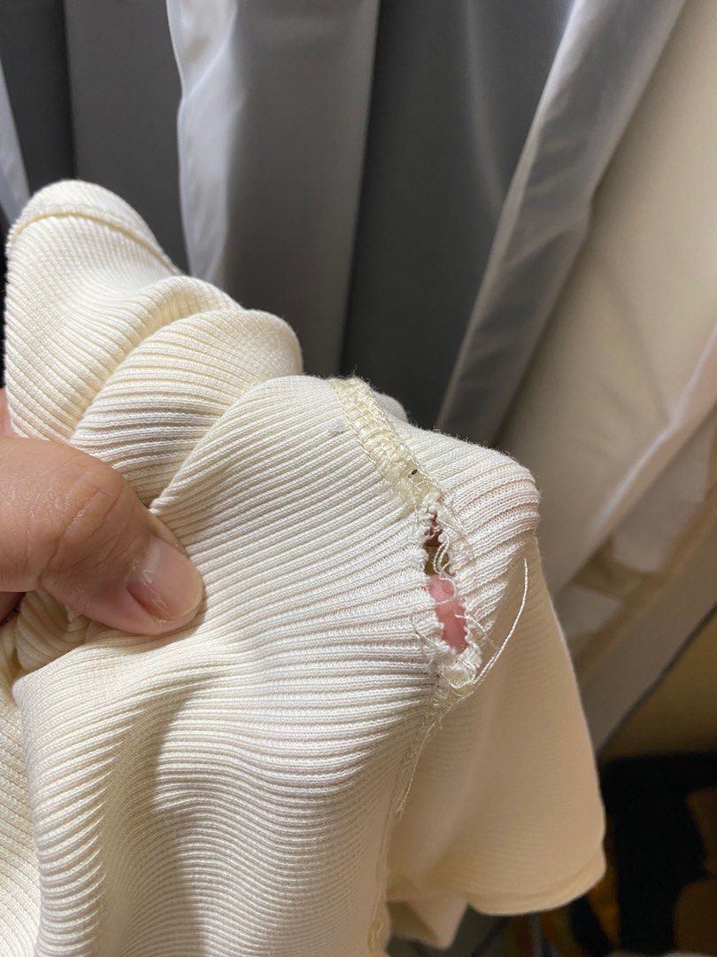 Zara Off-Shoulder Ribbed Top (Category: Blouses) located in Pasay City. Submitted by _jkching (Listing ID 1412271930, Image 3). Description: - Zara off-shoulder top - Cream color - Size S - Ribbed texture - Long sleeves - Condition: Tear on sleeve.