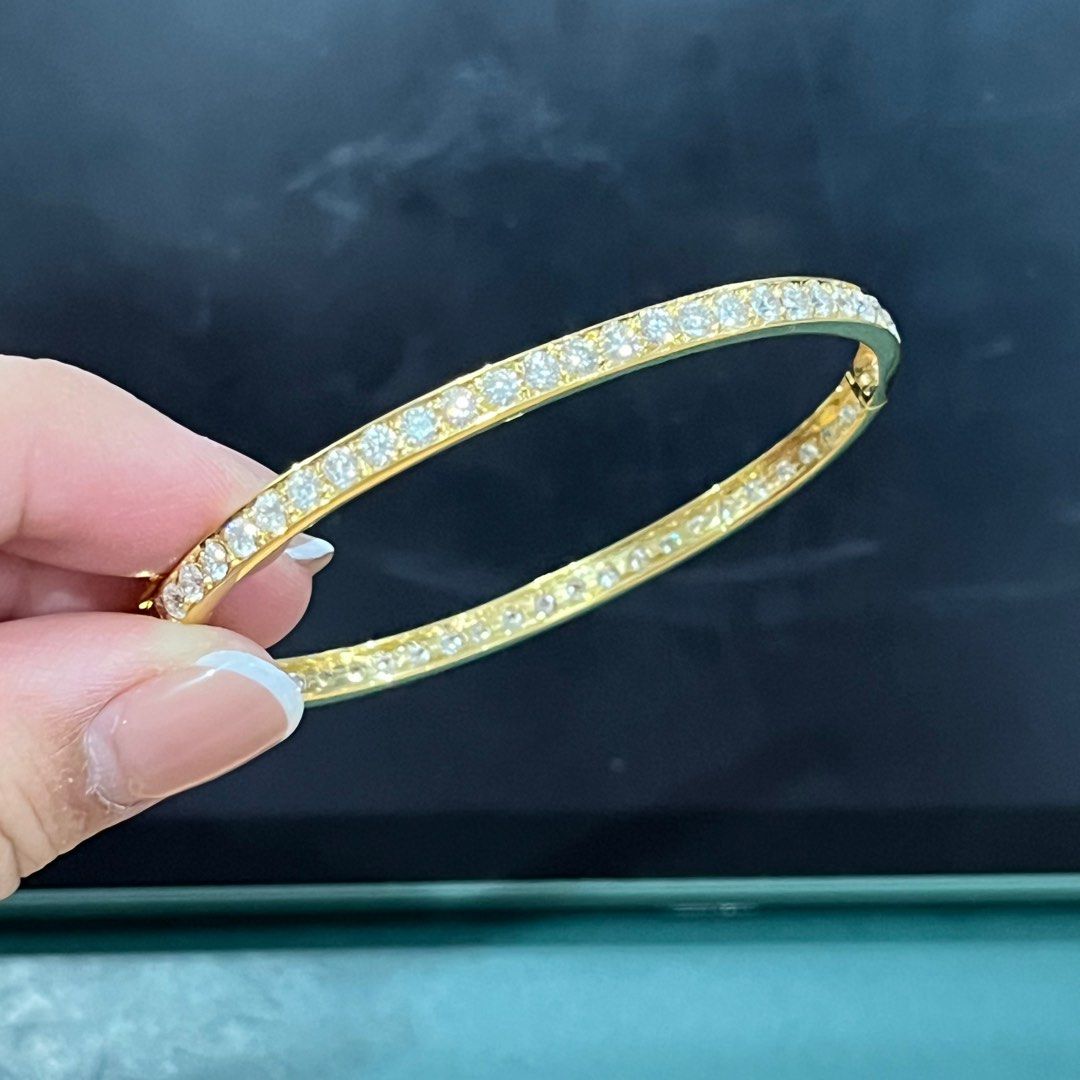 RUSH 18k Gold Diamond tennis bangle 17cm (Category: Bracelets) located in Del Monte. Submitted by bellamente (Listing ID 1412503695, Image 1). Description: RUSH ‼️ 18k Gold Tennis Bangle Bracelet 9.6grams yellow gold Lab grown diamonds Over 4carats total 17cm size Double lock type Everyday gold bangle 😍.