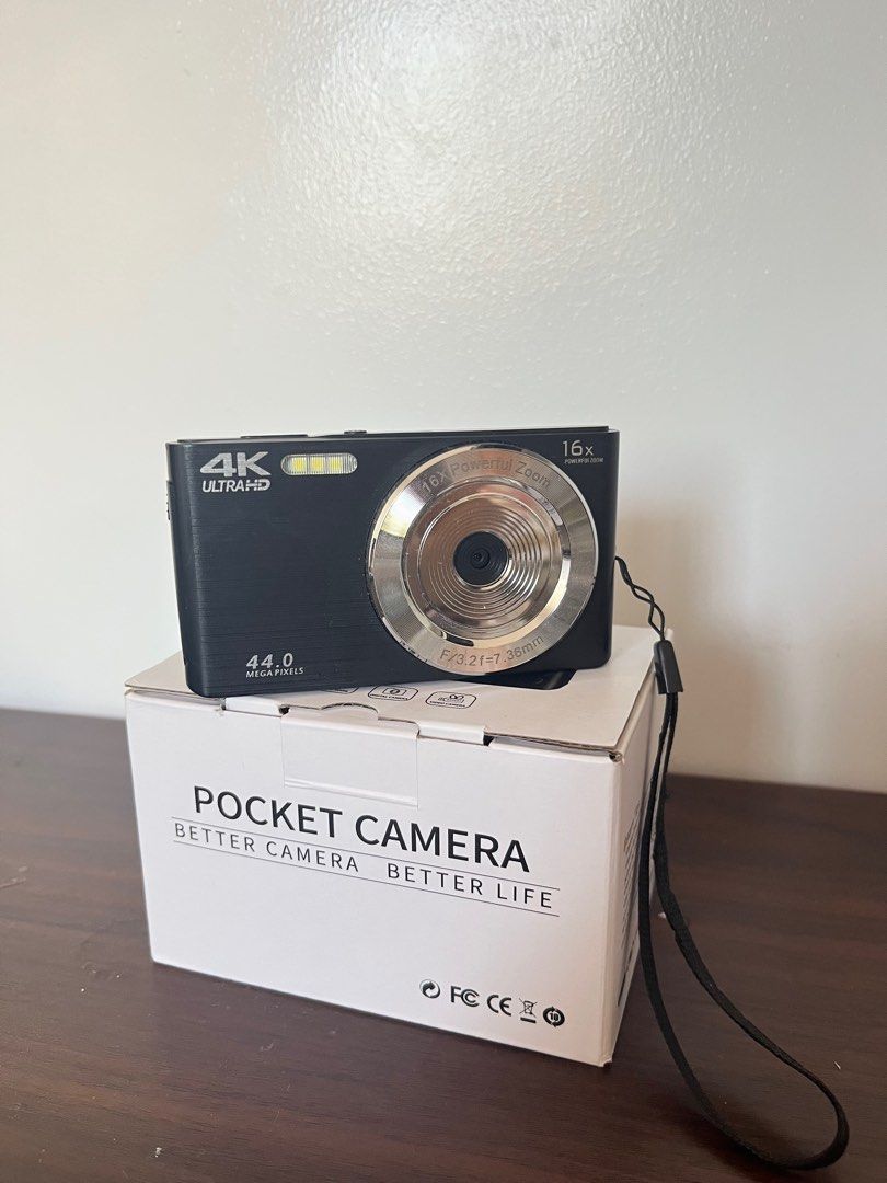 4K Ultra HD Pocket Camera (Category: Cameras) located in Cabanatuan. Submitted by shynxx.tlntn (Listing ID 1412378083, Image 2). Description: - 4K Ultra HD Video Recording - 16x Powerful Zoom - 44.0 Megapixel Sensor - Built-in Flash - Includes Original Box - Features Screen and Control Buttons - Comes with Wrist Strap.