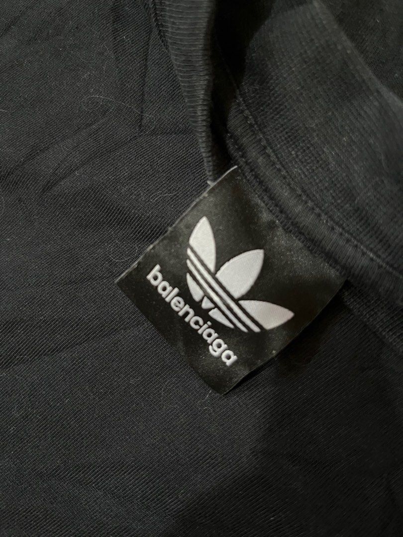 Adidas x Balenciaga (Category: Tshirts & Polo Shirts ) located in Baguio. Submitted by th.rift_shift (Listing ID 1412342385, Image 2). Description: Excellent condition No issue Small on tag 30x22 Baguio Loc Buyer will shoulder shipping fee DM for more details.