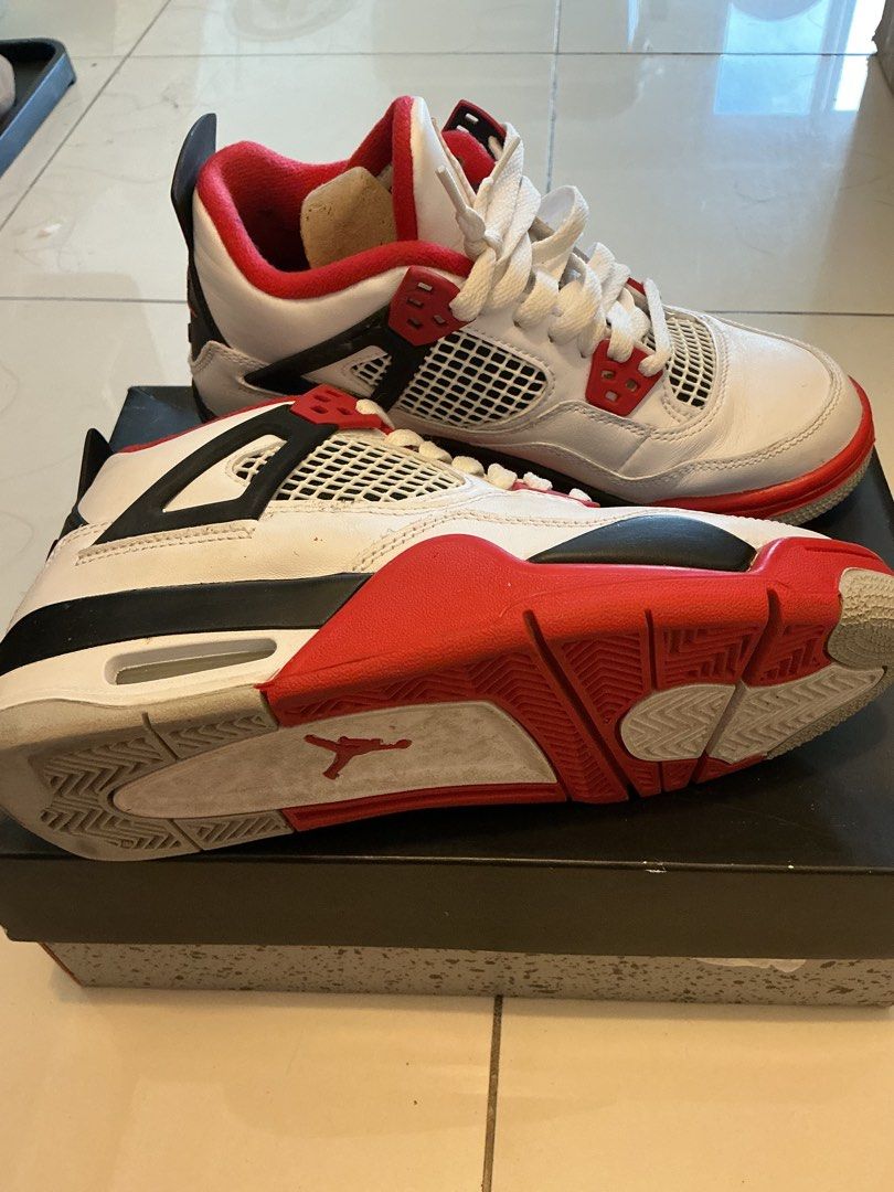 Air Jordan 4 Retro (GS) Fire Red (Category: Sneakers) located in Manila. Submitted by cleanupmode1993 (Listing ID 1412336505, Image 3). Description: - Air Jordan 4 Retro (GS) 'Fire Red' - Size: 4.5Y (US), UK 4, EUR 36.5 - White with red and black accents - Includes original box and packaging Used a couple of times only.