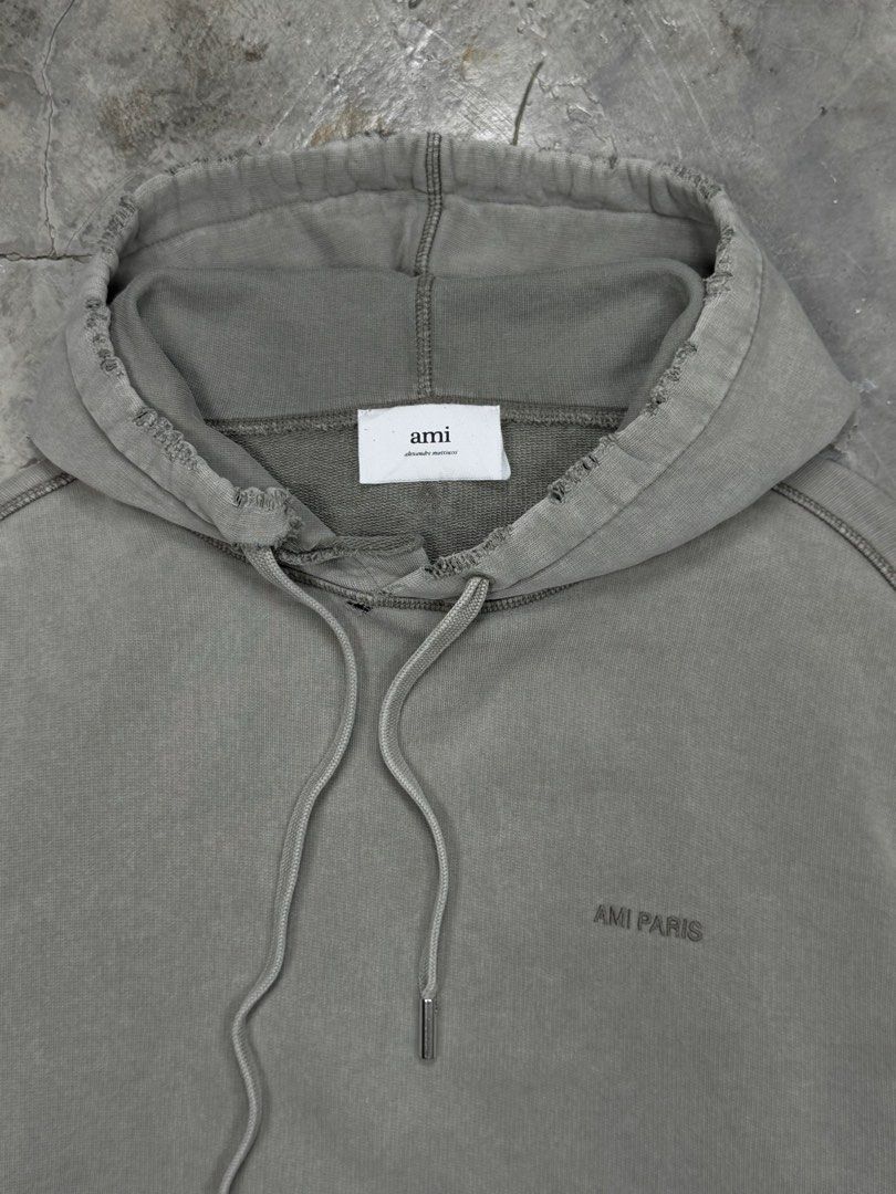 AMI Paris Distressed Hoodie (Category: Hoodies) located in Cebu City. Submitted by stylehub_ (Listing ID 1412357080, Image 2). Description: - AMI Paris hoodie -Size xL -width: 25 -length: 30 - Classic design - Embroidered AMI Paris logo - Made in Portugal - 100% cotton.