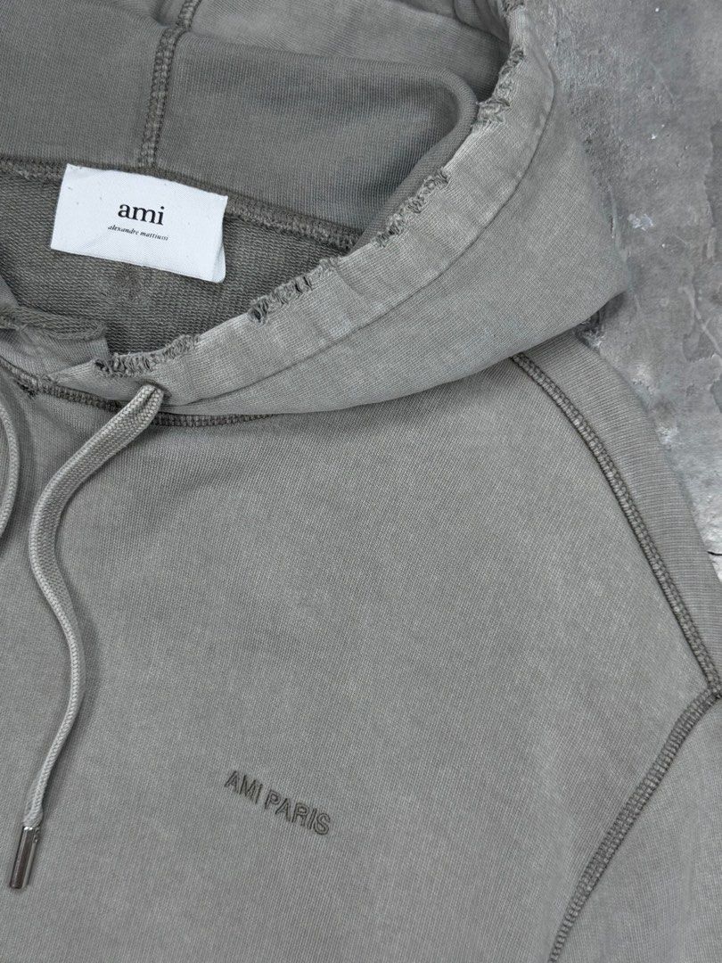 AMI Paris Distressed Hoodie (Category: Hoodies) located in Cebu City. Submitted by stylehub_ (Listing ID 1412357080, Image 3). Description: - AMI Paris hoodie -Size xL -width: 25 -length: 30 - Classic design - Embroidered AMI Paris logo - Made in Portugal - 100% cotton.