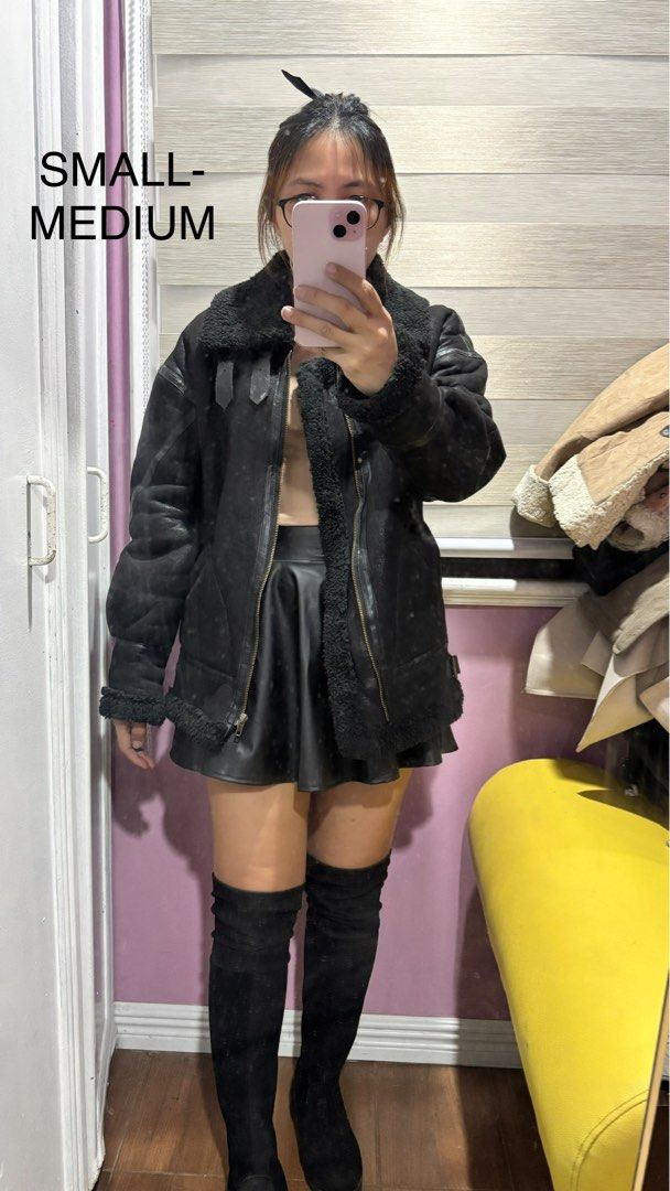 Black Shearling Jacket Small-Medium (Category: Coats, Jackets and Outerwear) located in Binan City. Submitted by coat_inthemiddle (Listing ID 1412512396, Image 1). Description: - Black shearling jacket - Faux fur lining & collar - Zipper closure - Buckle details - Size: Small to Medium - Perfect for colder weather - Versatile style.