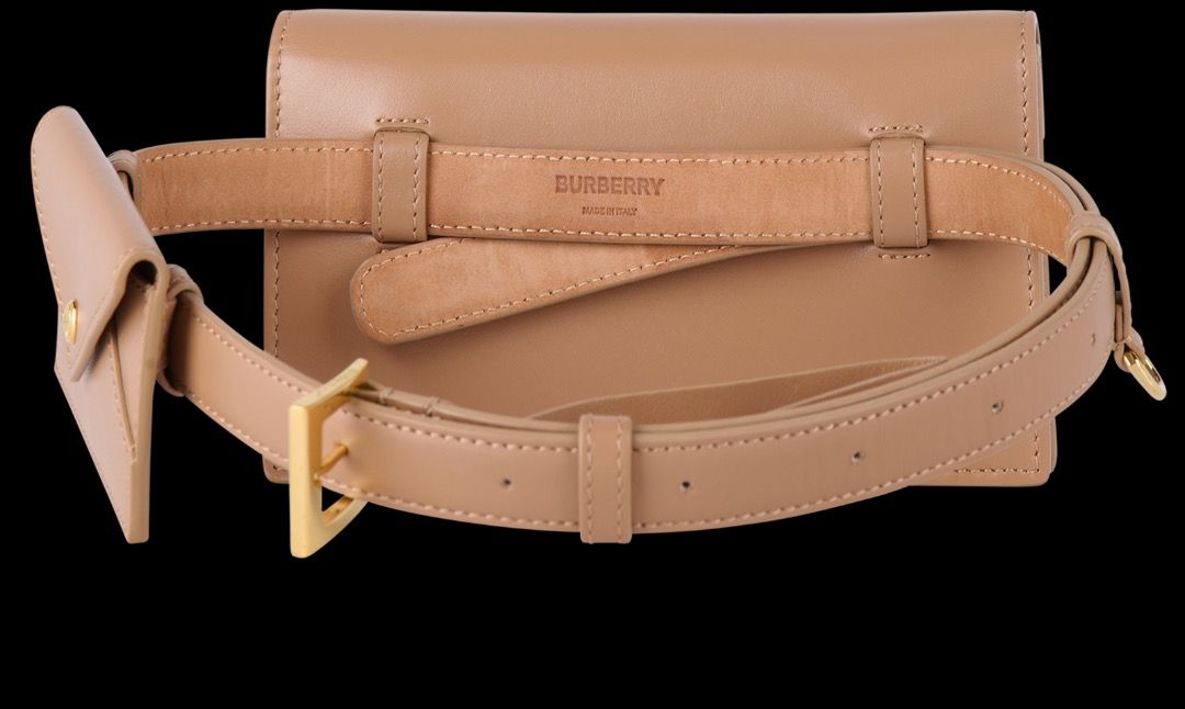 Burberry Quilted TB Belt Bag (Category: Luxury Bags & Wallets) located in Las Pinas. Submitted by eyes_jade (Listing ID 1412431641, Image 2). Description: - Burberry belt bag - Quilted design - TB logo - Tan color - Gold-toned hardware - Flap closure - Adjustable belt - Includes dust bag - Compact and stylish Size: 2cm x 10cm x 18cm.