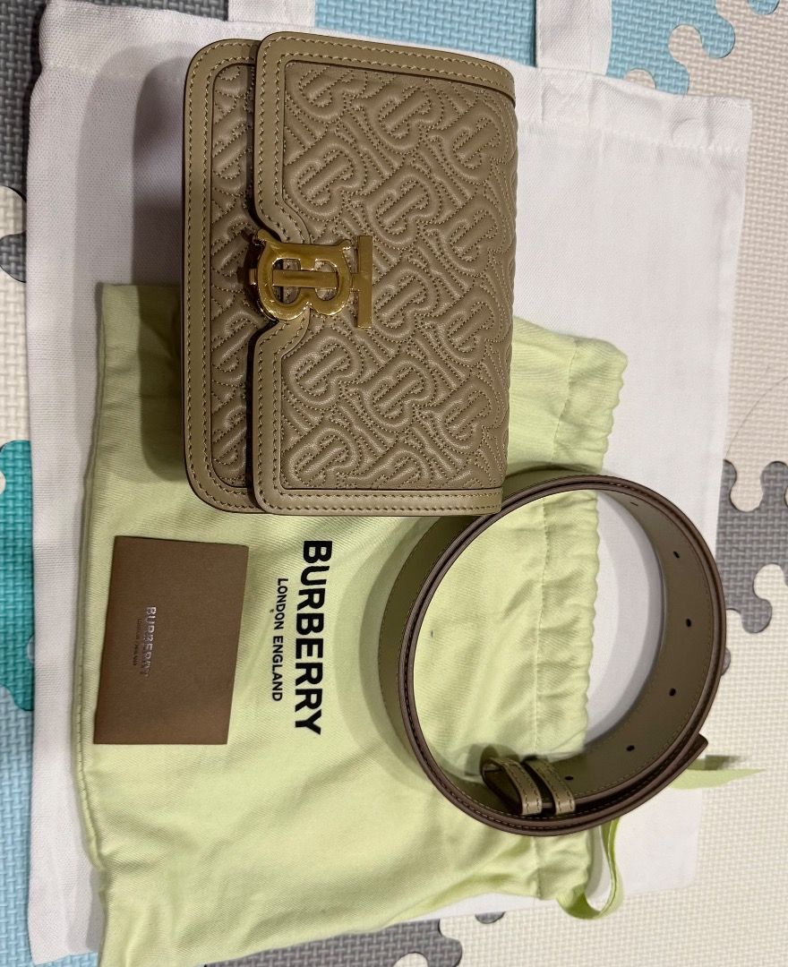 Burberry TB Bum Bag with Belt (Category: Luxury Bags & Wallets) located in Las Pinas. Submitted by eyes_jade (Listing ID 1412425313, Image 1). Description: Burberry small quilted Lola bag in beige leather with gold-tone hardware. - Authentic Burberry TB bag and matching belt - Iconic TB monogram pattern - Color: Light beige/taupe - Includes dust bag and card - Gold-tone clasp.