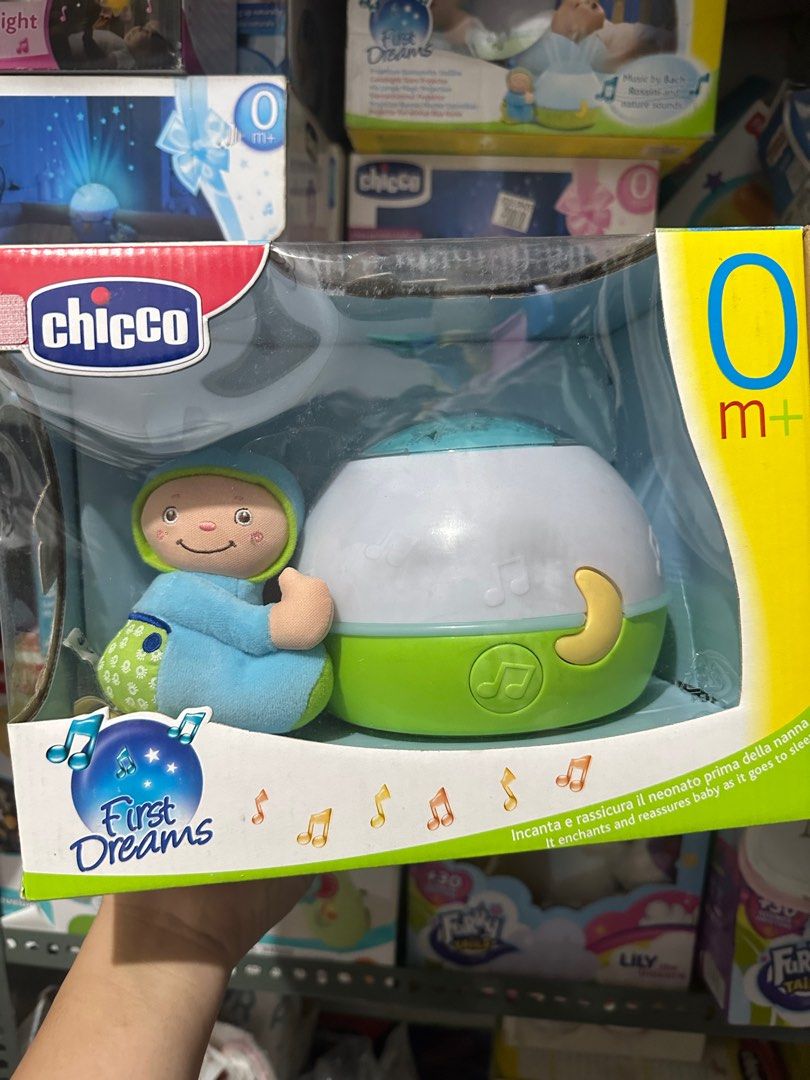 Chicco First Dreams Goodnight Stars Projector (Category: Projectors) located in Manila. Submitted by airacruz0048042 (Listing ID 1412504004, Image 2). Description: - Chicco First Dreams Goodnight Stars Projector - Projects stars onto the ceiling - Plays soothing music and nature sounds - Comes with a cute plush toy - Suitable for newborns (0m+) - Designed to enchant and reassure babies at bedtime.