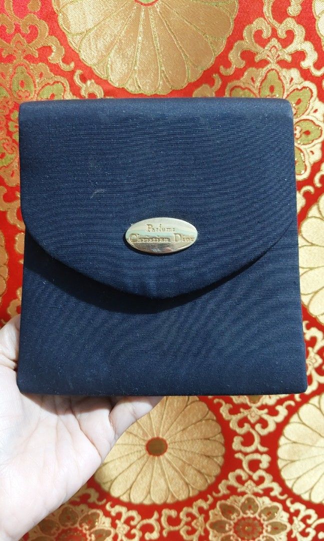 Christian Dior Purse (Category: Luxury Bags & Wallets) located in Muntinlupa City. Submitted by sakurambo_des (Listing ID 1412519842, Image 1). Description: Christian Dior Parfume Handbag/Purse in very good condition..
