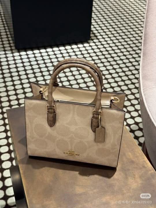 Coach Maggie small Tote Handbag (Category: Luxury Bags & Wallets) located in Manila. Submitted by jay_cee241623 (Listing ID 1412358943, Image 3). Description: - Coach Maggie small Tote handbag - Iconic Coach pattern - Available colors: Black and Beige - Top handle design - Includes small tag - Gold-tone hardware - Perfect for everyday use SUPERSALE COACH BAG 🤩 🖇 3,500 each + SF 🖇 💯% Authentic & Brandnew 💯% Complete Inclusions.