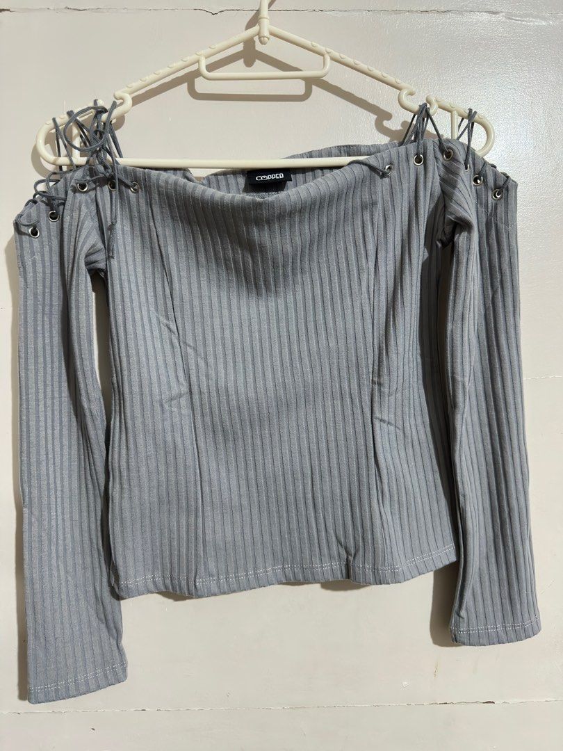 Copper Off-Shoulder Ribbed Top (Category: Blouses) located in Las Pinas. Submitted by lanxichen (Listing ID 1412426971, Image 3). Description: - Copper off-shoulder top - Long sleeves - Ribbed texture - Lace-up details on shoulders - Boat neck style - Brand tag visible.