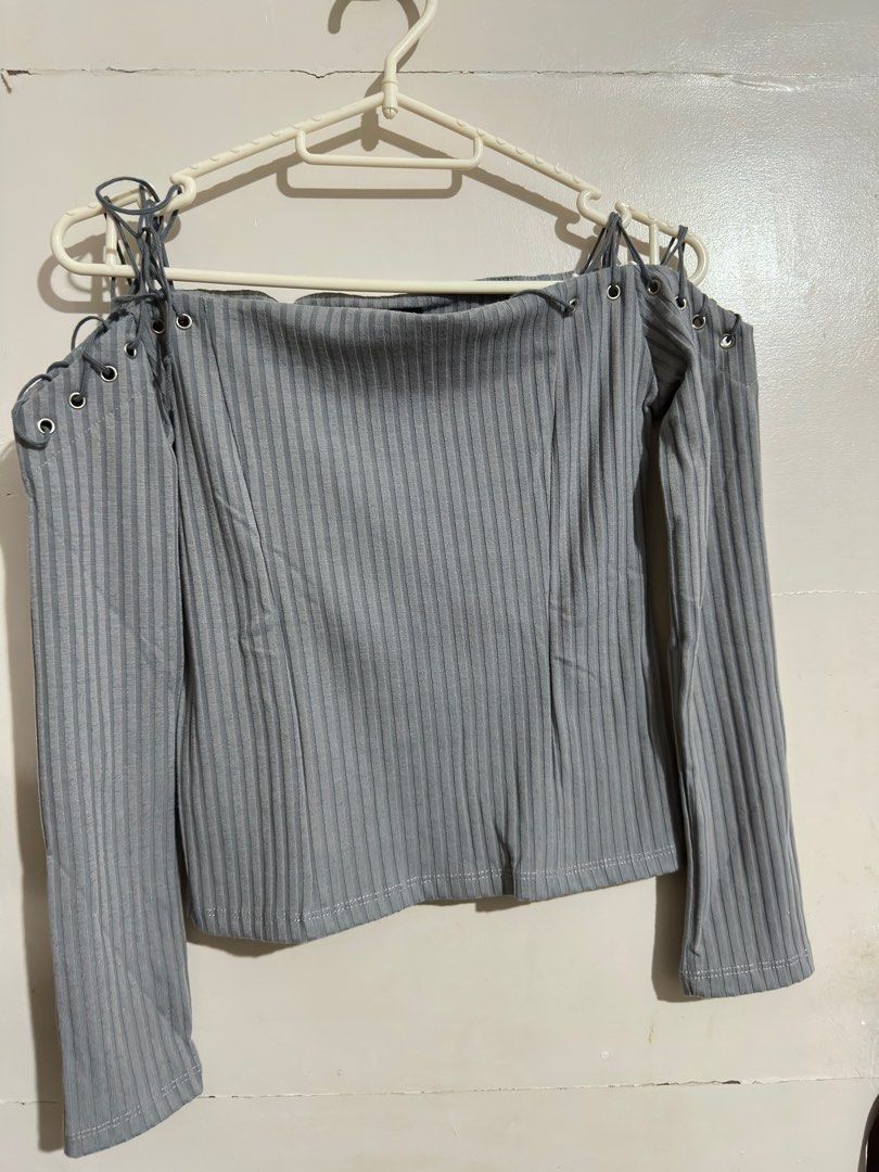 Copper Off-Shoulder Ribbed Top (Category: Blouses) located in Las Pinas. Submitted by lanxichen (Listing ID 1412426971, Image 1). Description: - Copper off-shoulder top - Long sleeves - Ribbed texture - Lace-up details on shoulders - Boat neck style - Brand tag visible.