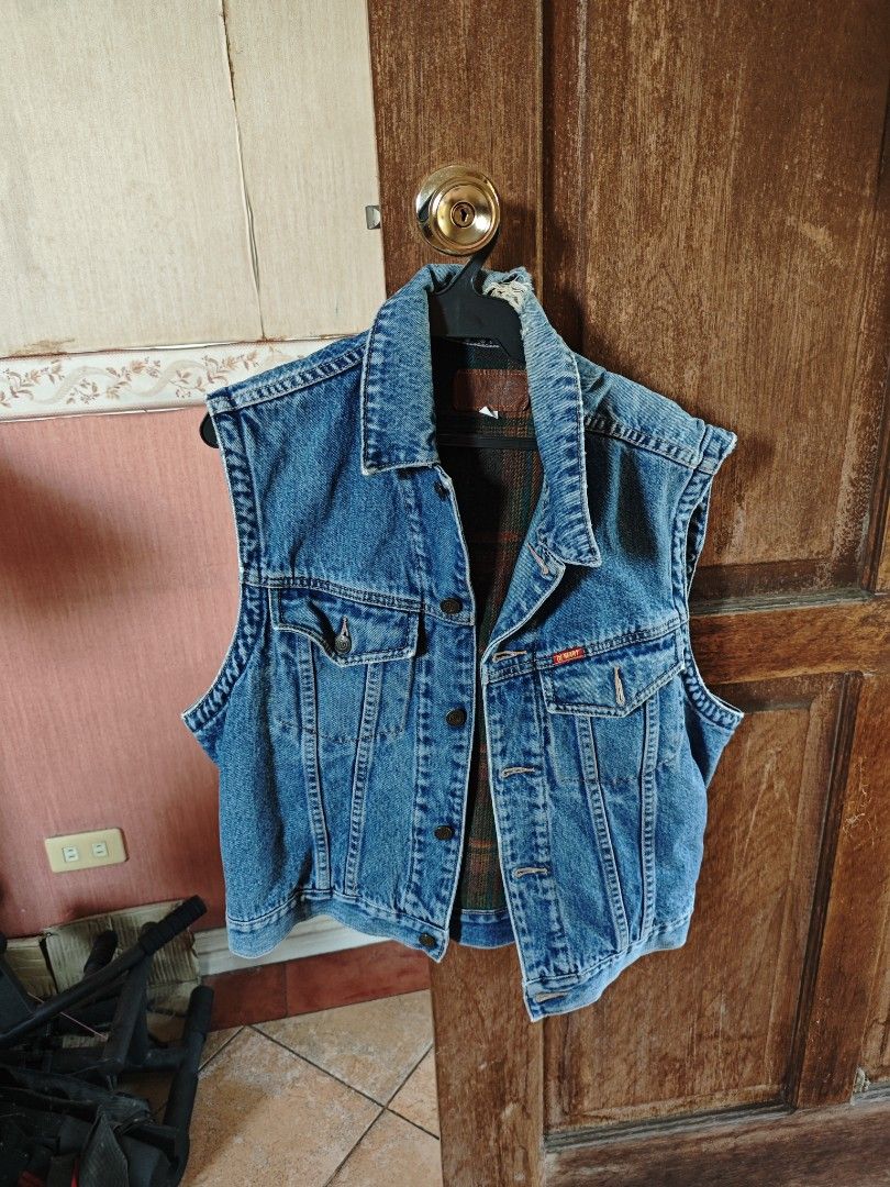 Denim Vest (Category: Vests) located in Paranaque City. Submitted by marsman1official (Listing ID 1412410187, Image 1). Description: - Classic denim vest - Medium blue wash - Collared neckline - Button-down closure - Two chest pockets - Tailored fit - Perfect for layering.
