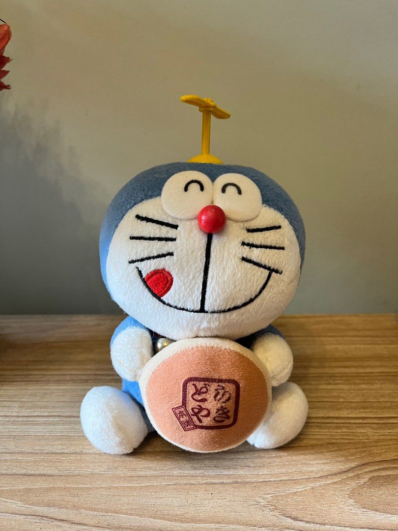 Doraemon and Damulag Plush Toys (Category: Plushies & Soft Toys) located in Quezon City. Submitted by metamerchant (Listing ID 1412479440, Image 2). Description: For Doraemon collectors! Authentic NTT Original (Japan) matching plush set featuring Doraemon and Gian (Takeshi Gouda). Brand: NTT Original (Genuine Japan licensed) Condition: Excellent condition, very clean and vibrant. Authenticity: Both plushies still have their original NTT blue/red 