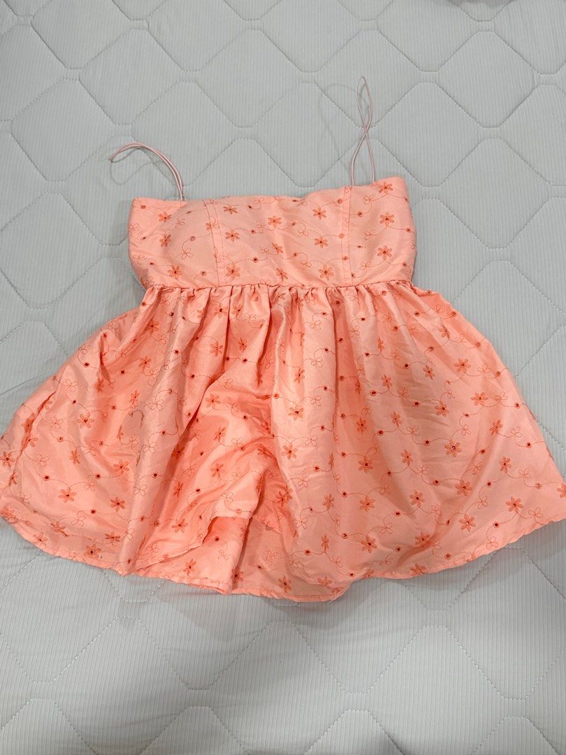 Eyelet Babydoll Padded Top (Category: Dresses) located in Manila. Submitted by clutterdeclutter (Listing ID 1412514356, Image 1). Description: Washed but never worn. More salmon in color (actual) Padded (can be worn without bra) Can be worn with the strap or as tube top Fits small to medium frames Shipping fee c/o buyer.