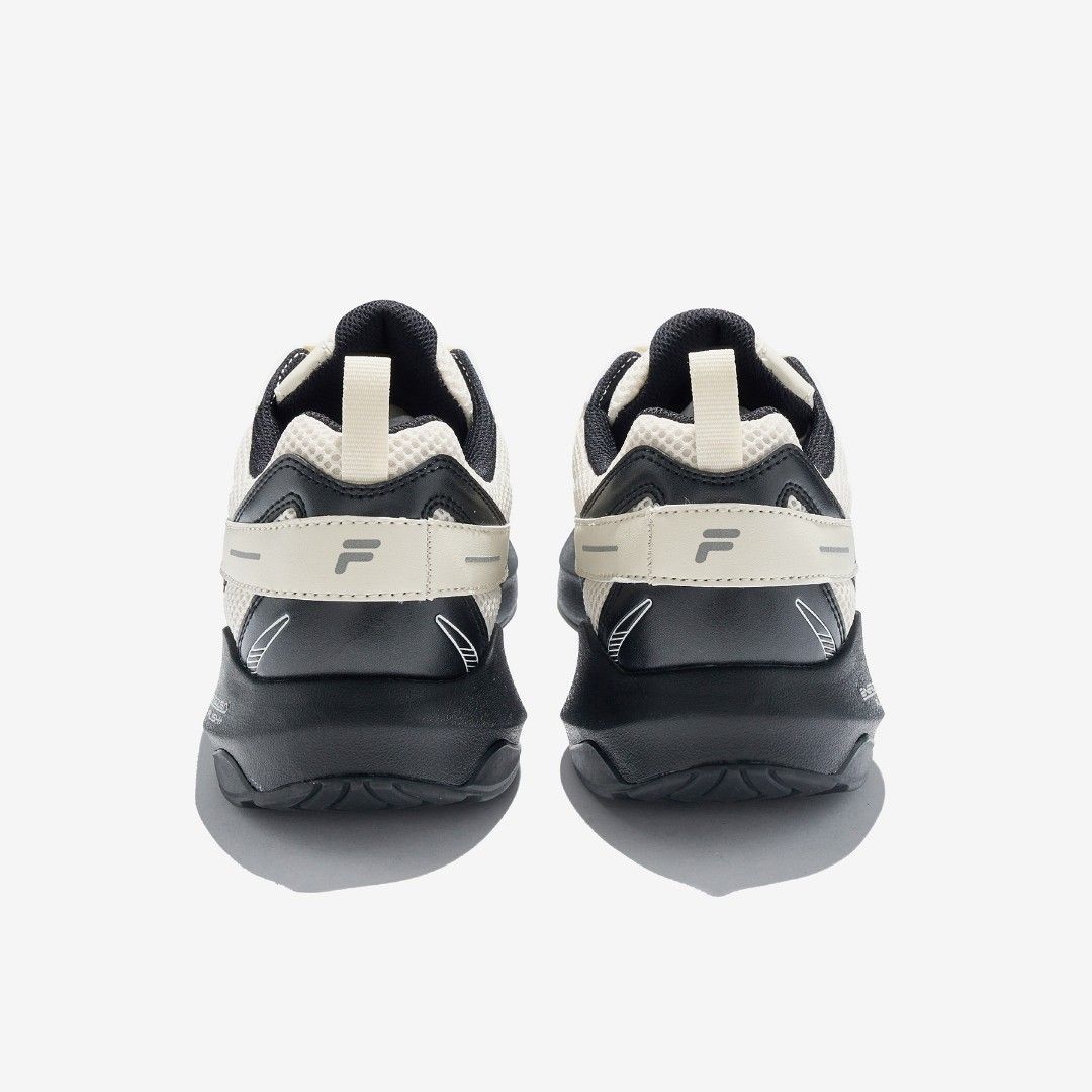 Fila Float (Category: Sneakers) located in Singapore. Submitted by themineralbottles (Listing ID 1412437835, Image 2). Description: Worn once but selling because size didnt fit well Bought at 99000 Korean Won.