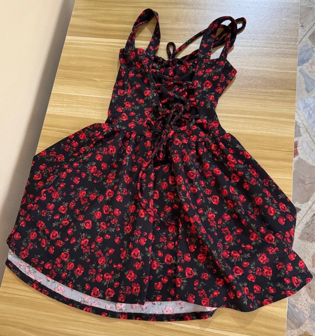 Floral Mini Dress with Tie-Up Back (Category: Dresses) located in Quezon City. Submitted by mristl (Listing ID 1412430874, Image 2). Description: - Can fit XS - M - Tie-up back - bust 32-38 inches - length 31 inches - waist 24-30 inches - crepe fabric (can stretch 1-2 inches).