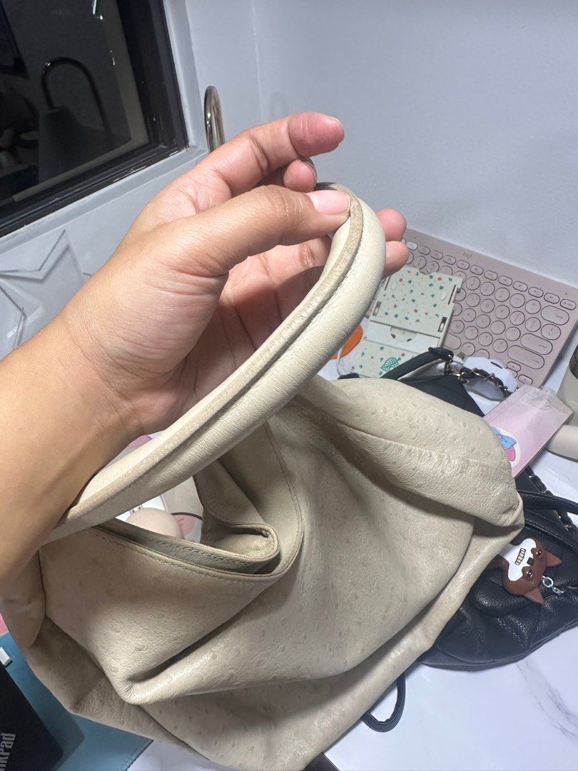 Furla Hobo Bag (Category: Luxury Bags & Wallets) located in Quezon City. Submitted by aceccrts (Listing ID 1412487580, Image 2). Description: - Original Cream-colored Furla hobo bag - Textured leather exterior - Comfortable single shoulder strap - Spacious interior - Features the Furla logo Dimensions: Width (at bottom): Around 14 inches (approx. 36 cm). Height: Approximately 33-38 cm (13-15 inches). Depth: Around 12-14 cm (4.7-5.5 inches). Handl