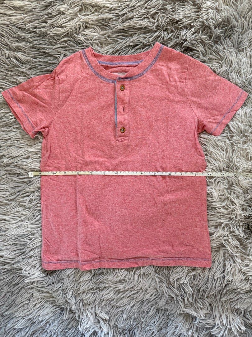Gingersnaps Boys T-shirt (Category: Tshirts & Polo Shirts ) located in Muntinlupa City. Submitted by caistuff (Listing ID 1412389777, Image 3). Description: LAST PRICE POSTED ALREADY. - Red Henley T-shirt - Classic button-up neckline - Short sleeves - Blue stitching details - Soft, comfortable fabric Dimes: - Length: 17 inches - Width: 12 inches.