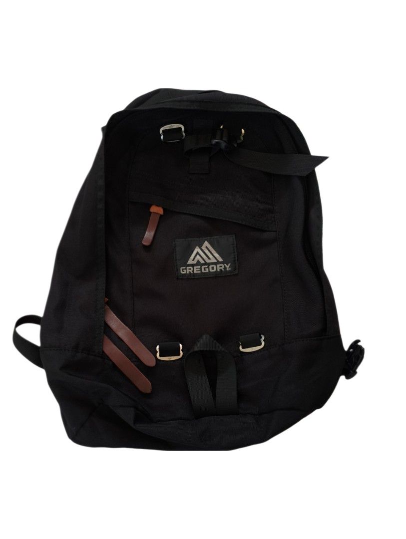 Gregory Backpack Black (Category: Backpacks) located in Pototan. Submitted by pastthreads (Listing ID 1412333912, Image 1). Description: - Black Gregory backpack - Multiple compartments - Adjustable shoulder straps - Waist strap for support - Front pocket with leather accent - Top flap closure with buckles - Minor scratches on bottom..