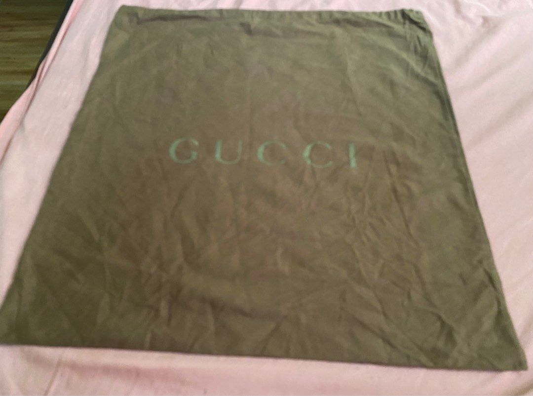 Gucci Dust Bag (Category: Luxury Bags & Wallets) located in Cagayan de Oro. Submitted by ecolive (Listing ID 1412364356, Image 1). Description: Authentic Gucci dust bag. Features the Gucci logo printed on the front. Made in Italy. The bag is a solid color. Perfect for protecting your Gucci handbags and accessories. 20w x 22h.