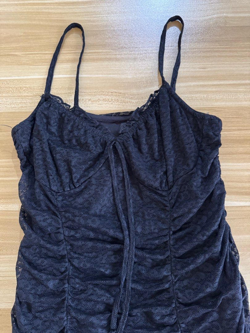 H&M Divided Black Ruched Dress (Category: Dresses) located in Quezon City. Submitted by mristl (Listing ID 1412380661, Image 1). Description: - Bought from physical store - Size M (11.5 x 24 manual measure) - Spaghetti straps - Lace trim on neckline - Tie detail at bust - Textured fabric.