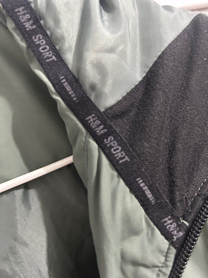 H&M Sport Hooded Puffer Jacket (Category: Coats, Jackets and Outerwear) located in San Fernando. Submitted by awesomecessa (Listing ID 1412334493, Image 3). Description: - H&M Sport jacket - Hooded design - Full-length zipper - Two zippered front pockets - Black hood accent - Solid green color - H&M Sport logo inside hood - Lightly Padded -Bought in Men’s size XS, but fits perfectly for Women’s size Small Used in Korea & Mt Pulag Selling for a ve