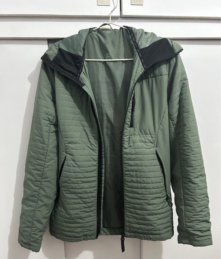 H&M Sport Hooded Puffer Jacket (Category: Coats, Jackets and Outerwear) located in San Fernando. Submitted by awesomecessa (Listing ID 1412334493, Image 1). Description: - H&M Sport jacket - Hooded design - Full-length zipper - Two zippered front pockets - Black hood accent - Solid green color - H&M Sport logo inside hood - Lightly Padded -Bought in Men’s size XS, but fits perfectly for Women’s size Small Used in Korea & Mt Pulag Selling for a ve