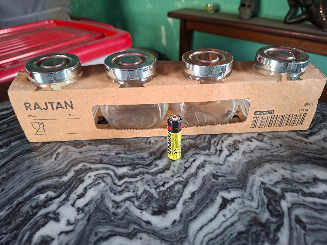 IKEA Spice Jars (Category: Food Organization & Storage) located in Taguig. Submitted by d_man11 (Listing ID 1412347646, Image 3). Description: IKEA Rajtan Spice Jars - Set of four IKEA Rajtan spice jars - Clear glass jars with silver lids - Brand new, still in original packaging - IKEA logo and '56' marked on the bottom of each jar - Empty and ready for your spices Dimension: - 8 x 8 x 6 cm.