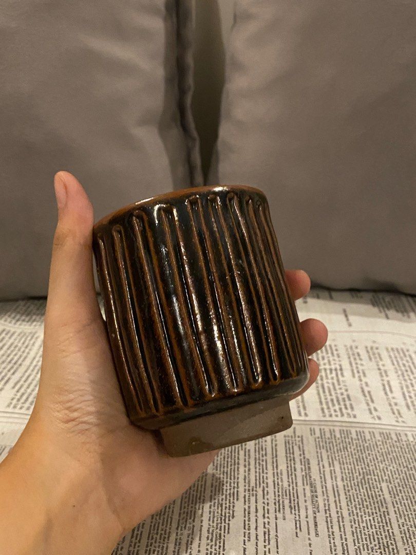 Japanese Surplus Brown Ribbed Ceramic Cup (Category: Other Kitchenware & Tableware) located in Rizal. Submitted by chm.ab (Listing ID 1412427086, Image 2). Description: stock: 2 • Japan surplus • Ceramic cup • Ribbed texture • Brown glaze • Comfortable to hold • Sold per piece • Pre-loved, good condition.