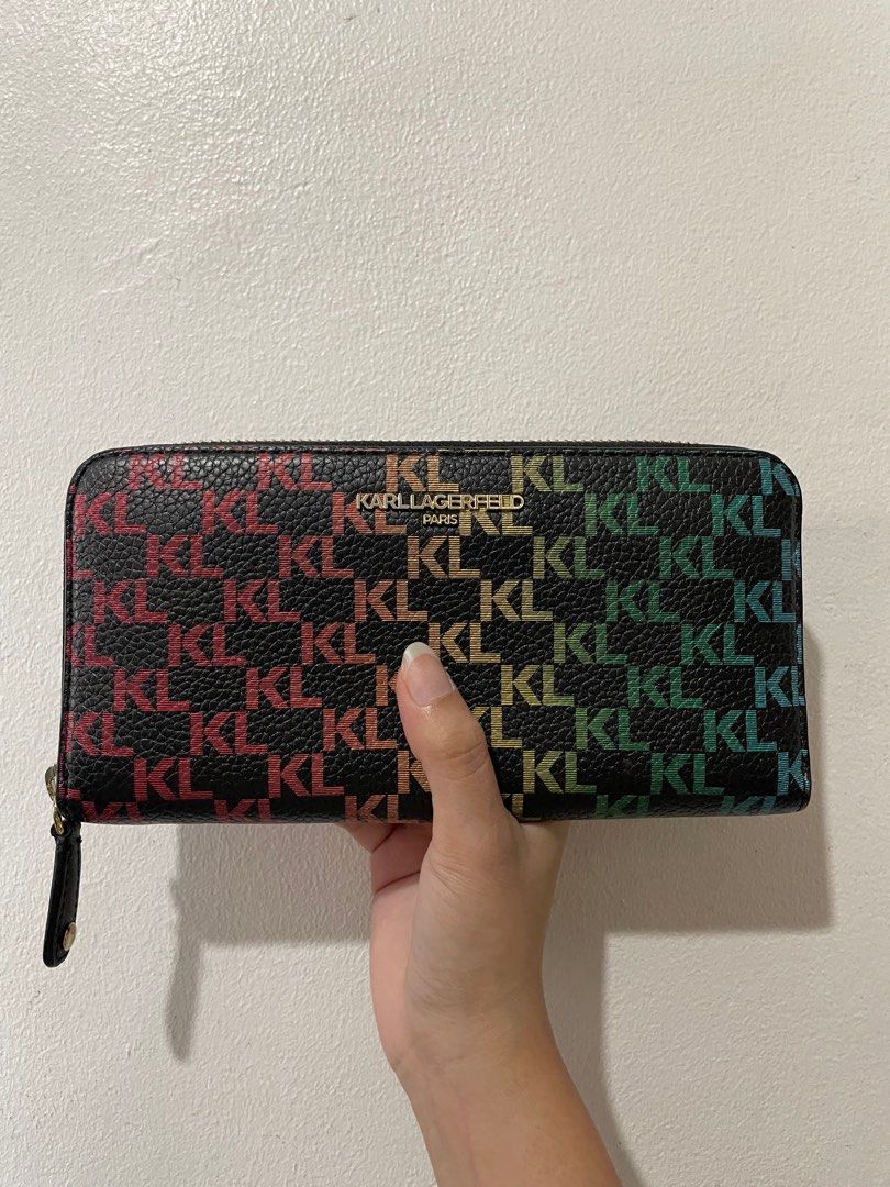 Karl Lagerfeld Rainbow Wallet/Crossbody (Category: Wallets & Card holders) located in Bacoor. Submitted by jdnsse (Listing ID 1412410141, Image 1). Description: KL long wallet -has crossbody strap -good as new (with tag pa) -8 card slots with 2 pockets for cash Negotiable 😊.