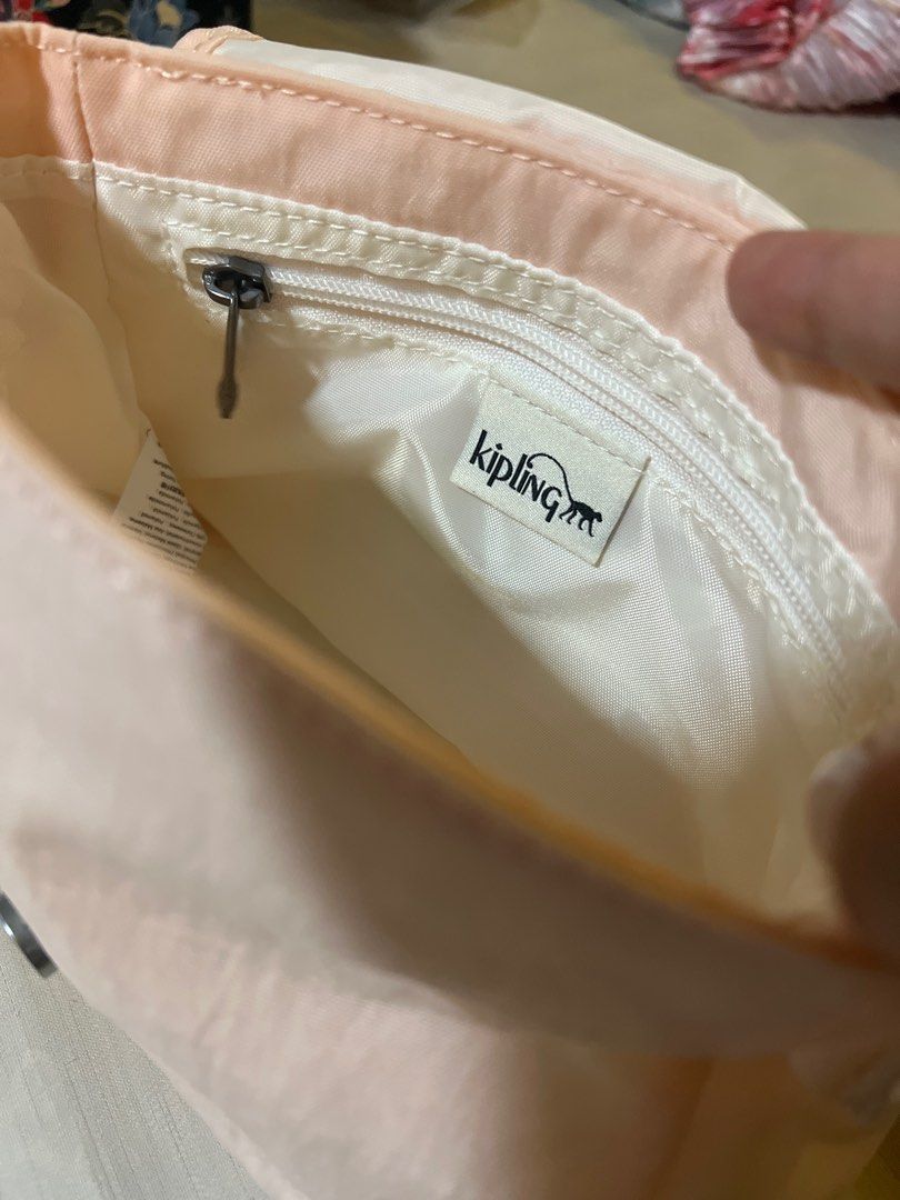 Kipling Crossbody Bag - Peach color (Category: Cross-body Bags) located in San Fernando. Submitted by _prelovedbysflp (Listing ID 1412428294, Image 3). Description: Kipling Sabian $54 = ₱ 3,177.20 .