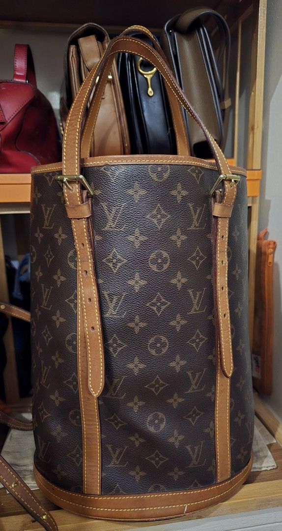 Louis Vuitton GM Bucket Bag (Category: Luxury Bags & Wallets) located in Manila. Submitted by thegoodthingsinlife (Listing ID 1412384246, Image 1). Description: Louis Vuitton GM bucket bag in classic monogram canvas. Authenticity not guaranteed. For those who cannot afford the real one worth 25k in the presale market, this bag is good enough. I have the Original petite bucket bag, and comparing them side by side, they are almost identical. The se
