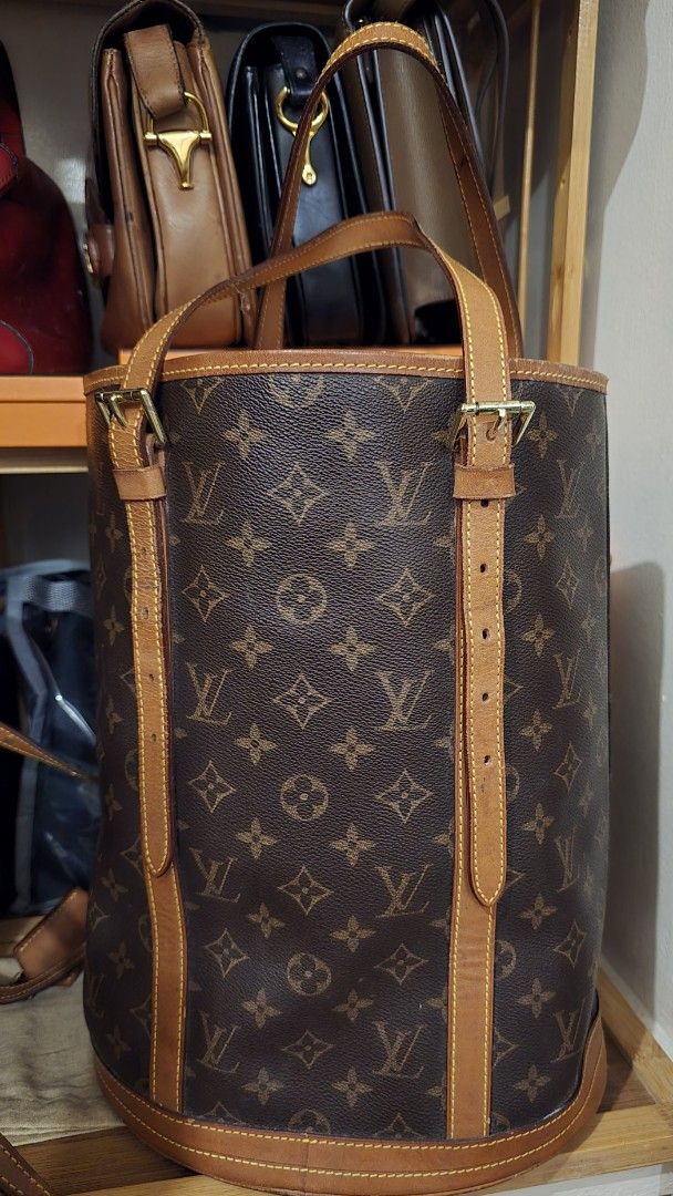 Louis Vuitton GM Bucket Bag (Category: Luxury Bags & Wallets) located in Manila. Submitted by thegoodthingsinlife (Listing ID 1412384246, Image 2). Description: Louis Vuitton GM bucket bag in classic monogram canvas. Authenticity not guaranteed. For those who cannot afford the real one worth 25k in the presale market, this bag is good enough. I have the Original petite bucket bag, and comparing them side by side, they are almost identical. The se