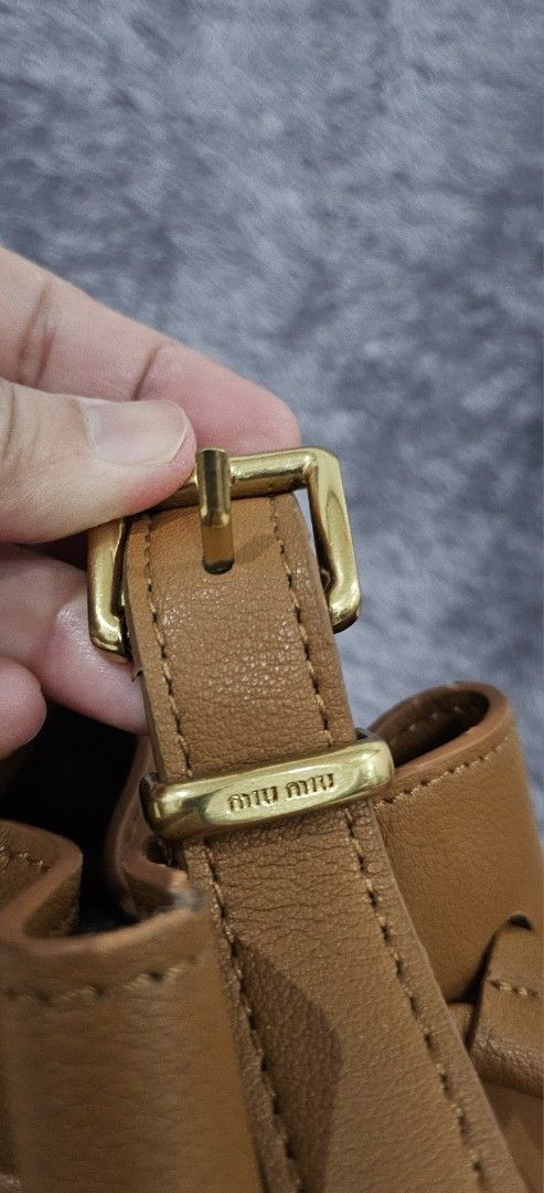 Miu Miu Logo Embossed Bucket bag (Category: Luxury Bags & Wallets) located in Alburquerque. Submitted by parchiracollection (Listing ID 1412461958, Image 3). Description: *Please self-authenticate *Please check detailed pics before making an offer *Plus SF *Courier: J&T (no rush shipping) *MOP: Gcash *No to low ballers *Up to 2 days reservation only.