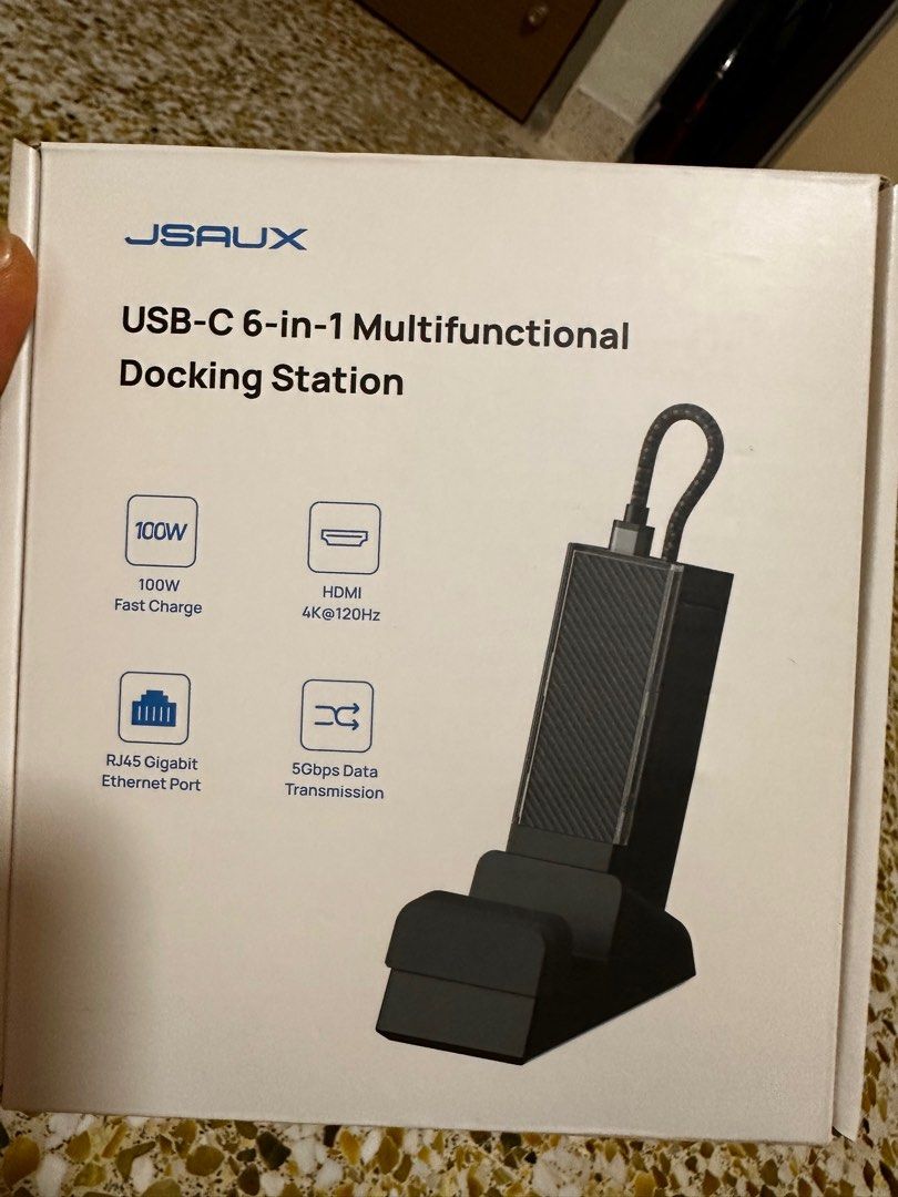 Multifunctional Docking station (Category: Other Accessories) located in Singapore. Submitted by bakkuhteh (Listing ID 1412491069, Image 1). Description: - JSAUX USB-C 6-in-1 Multifunctional Docking Station - Color: Black - Features: - 100W Fast Charge - HDMI 4K@120Hz - RJ45 Gigabit Ethernet Port - 5Gbps Data Transmission - Brand new in box - Model: HB0609.
