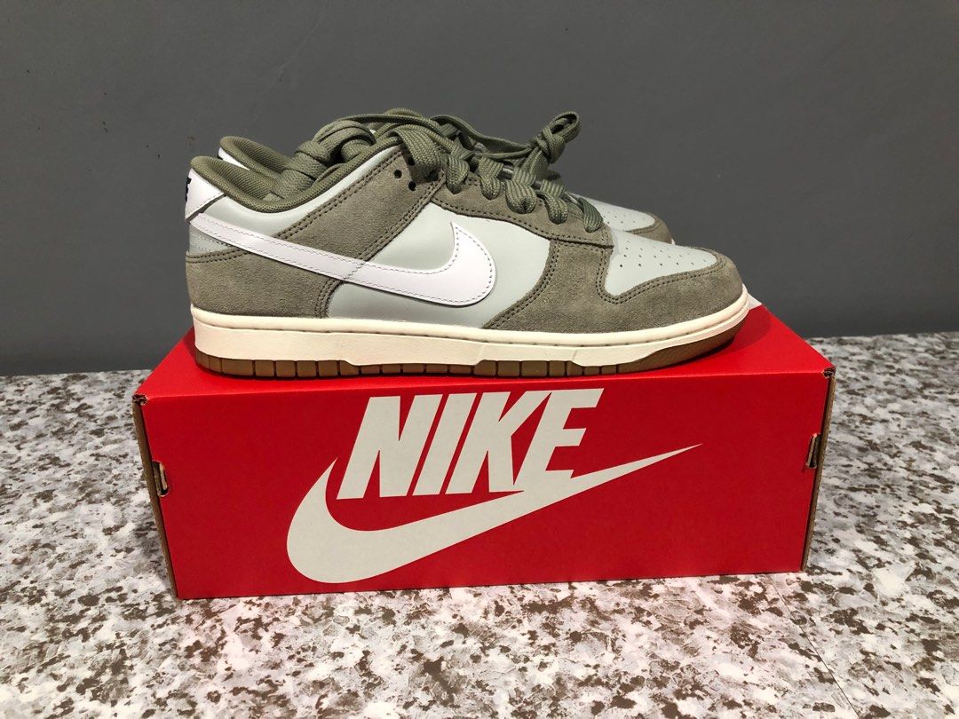 Nike Dunk Low Retro SE - Light Army (Category: Sneakers) located in Maasin. Submitted by niconii090 (Listing ID 1412351708, Image 2). Description: ✅AUTHENTIC BRAND NEW - Nike Dunk Low Retro SE - Light Army colorway - Size US 10 - Features light green and white color scheme with gum sole - Includes original box - Nike logo on tongue and heel - Nike logo on insole.