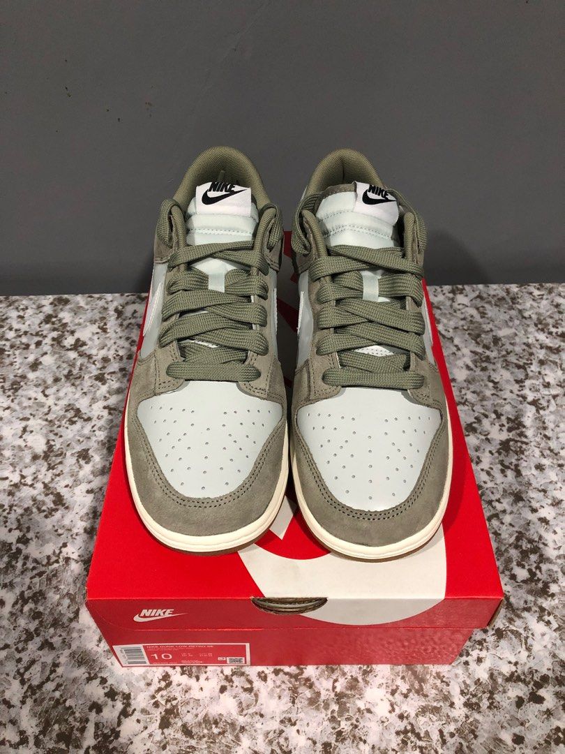 Nike Dunk Low Retro SE - Light Army (Category: Sneakers) located in Maasin. Submitted by niconii090 (Listing ID 1412351708, Image 3). Description: ✅AUTHENTIC BRAND NEW - Nike Dunk Low Retro SE - Light Army colorway - Size US 10 - Features light green and white color scheme with gum sole - Includes original box - Nike logo on tongue and heel - Nike logo on insole.