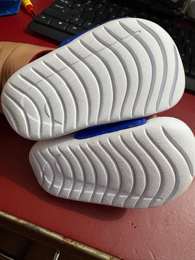 Nike Kawa Baby Sandals 4c (Category: Babies & Kids Fashion) located in Caloocan City. Submitted by vinzane (Listing ID 1412337629, Image 3). Description: - Nike baby sandals - Blue strap with white Nike logo - Maroon strap at the back - White sole - Designed for comfort and style - Fitted only - with box .