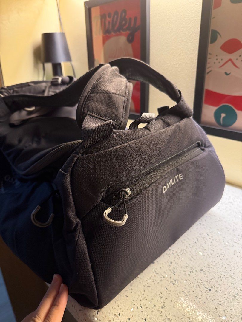 Osprey Daylite Duffel Bag (Category: Backpacks) located in Makati City. Submitted by ancsc (Listing ID 1412383446, Image 3). Description: Slightly negotiable Store bought (bratpack), interior is clean. Rfs: Will get a new gym bag Osprey Daylite duffel bag in dark grey. Features top handle, shoulder strap, zippered top compartment, and front pocket with carabiner. Durable, textured material..